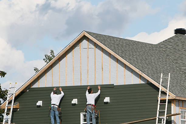 Professional Siding Installation technician working in Perrysville, OH